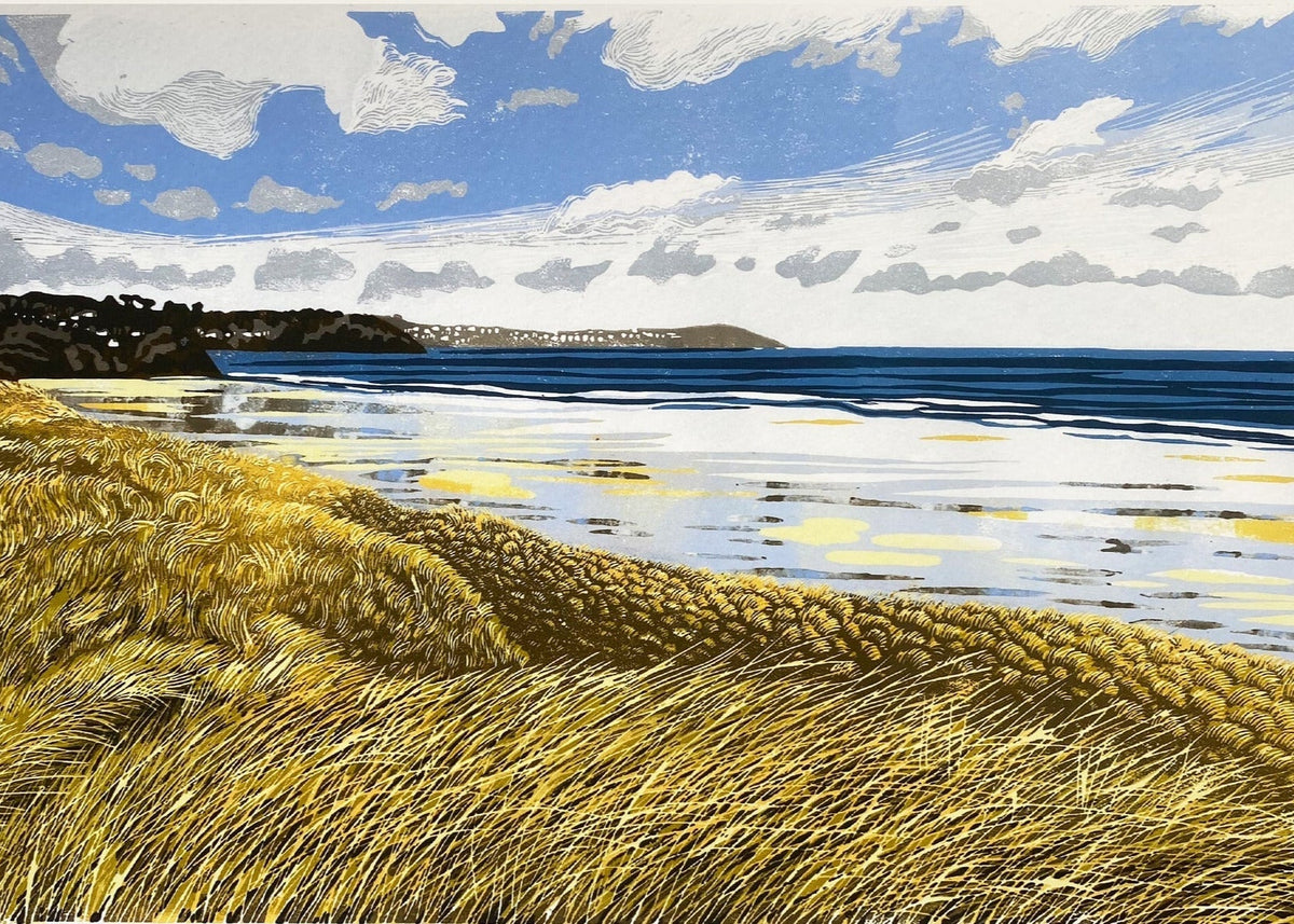 Looking from the sand dunes covered in their long sharp grasses across the wet reflective sandy beach of porth kidney at lelant towards St Ives. North coast Cornwall. A4 size art print from an original limited edition reduction linocut print